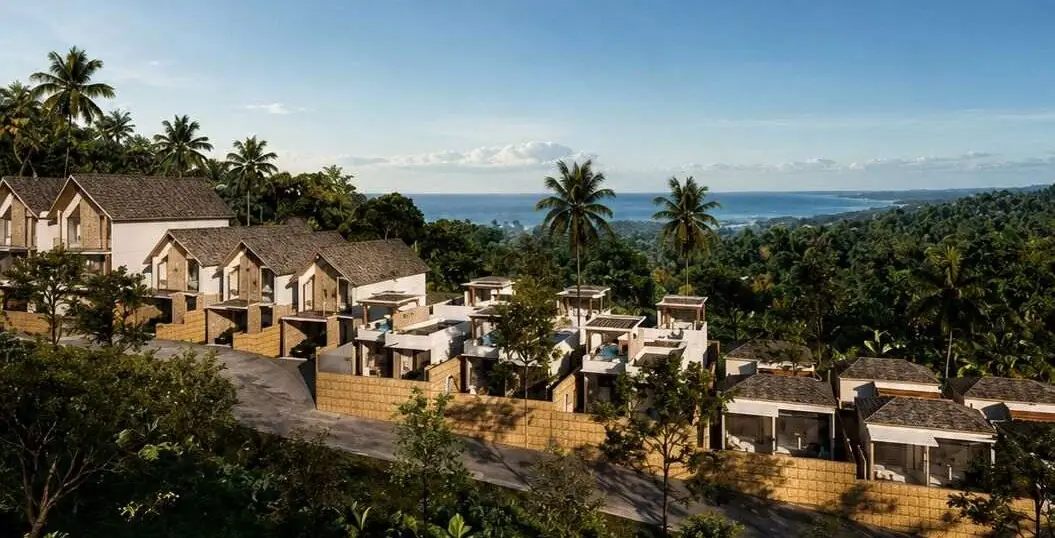 The Samaya villas on the hillside with the sea beyond